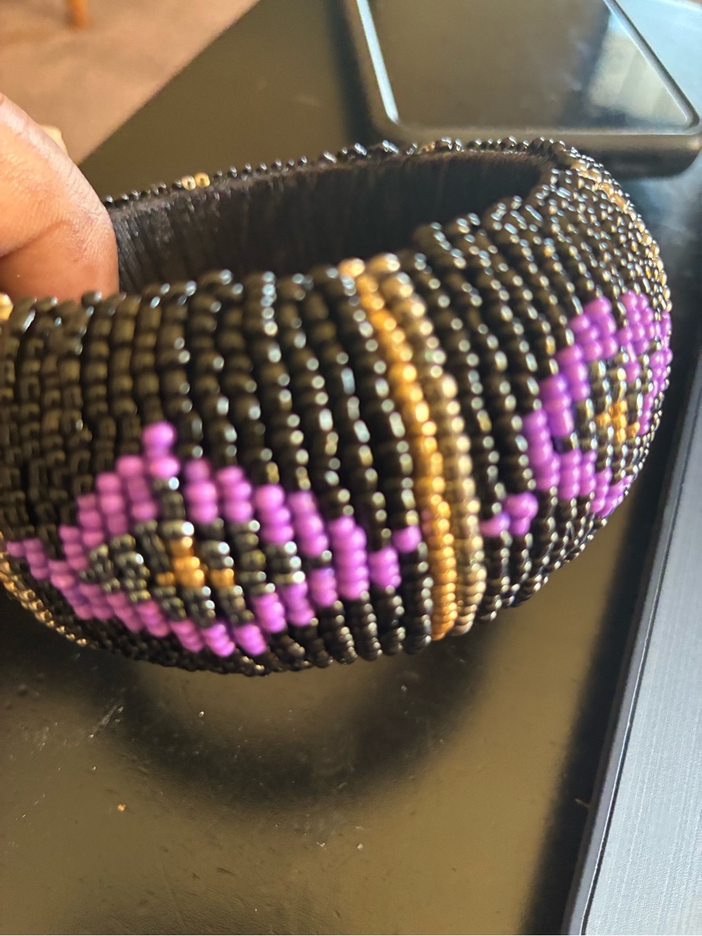 Handmade Black Beaded Bracelet with Purple and Gold Accents